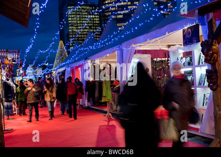 Paris, France, Crowds of people Shopping in Christmas Market at Night, La Défense Business Center Stock Photo