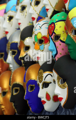 Venetian carnival masks for sale on souvenir stall Stock Photo