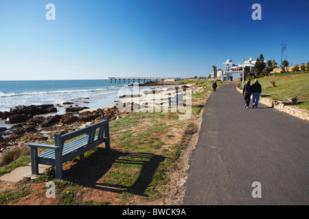 Couple walking along Summerstrand beachfront, Port Elizabeth, Eastern Cape, South Africa Stock Photo