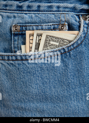 USA, Illinois, Metamora, American banknotes in front pocket of blue jeans Stock Photo