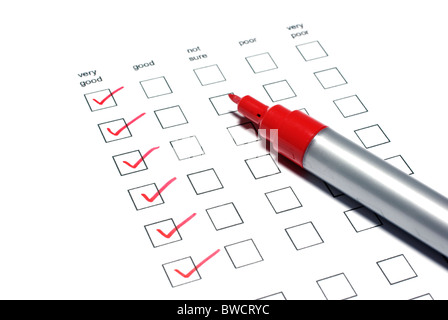 Poll list with red ticks and marker on white background. Stock Photo
