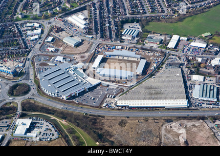 Aerial view of Tesco's Extra Super Store alongside Chesterfield Football Clubs new B2Net Soccer Stadium under construction Stock Photo