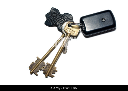 Keys with breloque isolated on white background. Stock Photo
