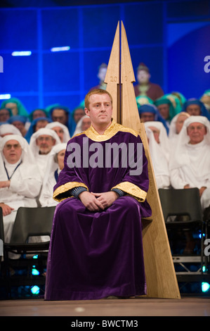 Tudur Hallam Chaired Bard during on stage ceremony at the National Eisteddfod of Wales annual Welsh cultural festival Stock Photo