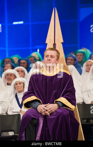 Tudur Hallam Chaired Bard during on stage ceremony at the National Eisteddfod of Wales annual Welsh cultural festival Stock Photo