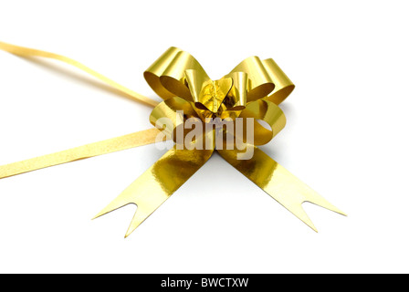 Golden knot isolated on white background. Stock Photo