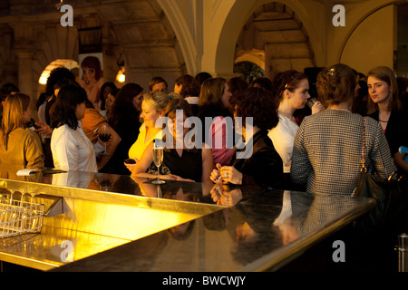 Women's networking event at a bar Stock Photo