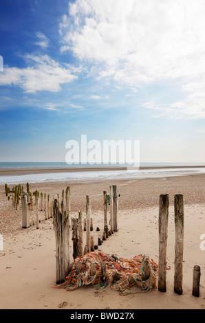 Wooden groin and old rope; Rye Harbour; East Sussex; England, Great Britain Stock Photo