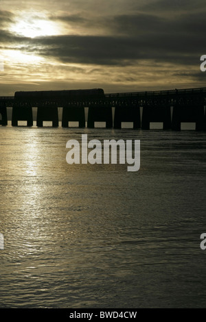 Train crossing the Tay Bridge, Dundee, Scotland. Stock Photo