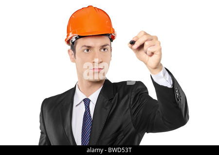 A view of a young architect holding a pen, ready to write something Stock Photo