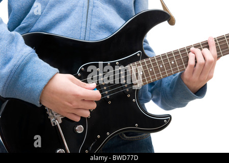 Teenager playing electric guitar on white background Stock Photo