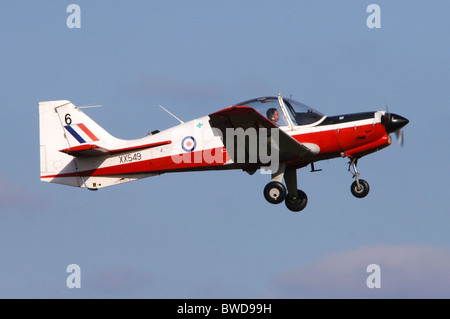 Scottish Aviation Bulldog T1 aircraft in the colours of RAF training colours climbing out after take off from RAF Benson Stock Photo