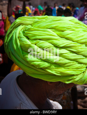 Brightly coloured Rajasthani Turban at a wedding celebration. Stock Photo