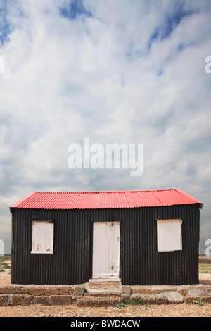 Red roofed fishing hut; Rye Harbour; East Sussex; England, Great Britain Stock Photo