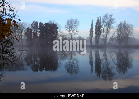 Early morning view across the River Thames from Kew Gardens looking towards Syon House, Richmond-on-Thames, London. Stock Photo