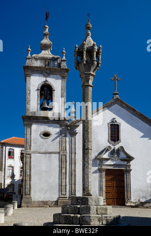 Portugal, the Beira Alta, Trancoso, Igreja de Sao Pedro church and the pillory Stock Photo