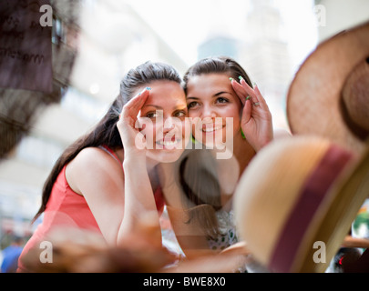Young women window shopping Stock Photo