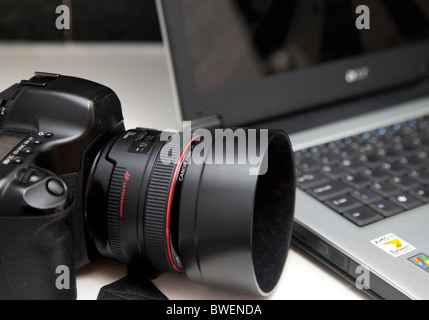 Computer Devices Digital Camera digital camera and laptop Stock Photo - Alamy
