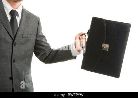 Close-up of businessman with briefcase in hand isolated on white background Stock Photo
