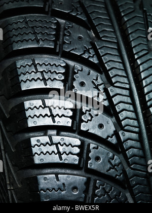 Closeup of a winter car tire tread texture