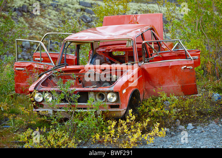 Broken in the accident and half-rotten old car Stock Photo
