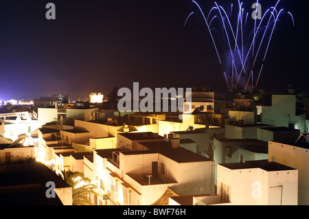 Fireworks on the beach promenade, Conil de la Frontera, Spain Stock Photo