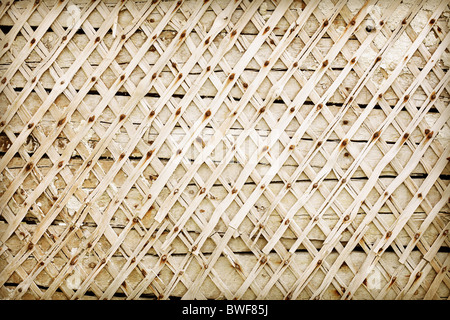 Old wooden wall deprived of plaster - background Stock Photo