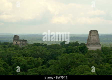 Temple I and Temple II from the top of Temple IV, Tikal, El Peten, Guatemala. Tikal is a UNESCO World Heritage Site. Stock Photo