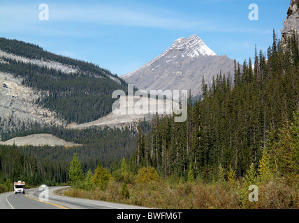 A motorhome or camper van on the Icefield Parkway in the Jasper National Park in the Canadian Rocky Mountains Stock Photo