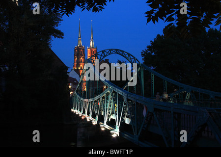 Cathedral of St. Johns the Baptist and the Tumski Bridge by night, Wroclaw, Lower Silesia, Poland. Stock Photo