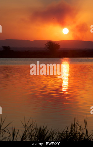 Sunset over water at Isimangaliso, Kwazulu-Natal, South Africa Stock Photo