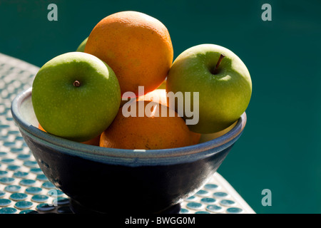 Bowl of Oranges and Apples Stock Photo