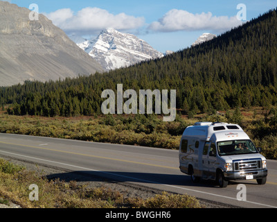 A motorhome or camper van on the Icefield Parkway in the Jasper National Park in the Canadian Rocky Mountains Stock Photo