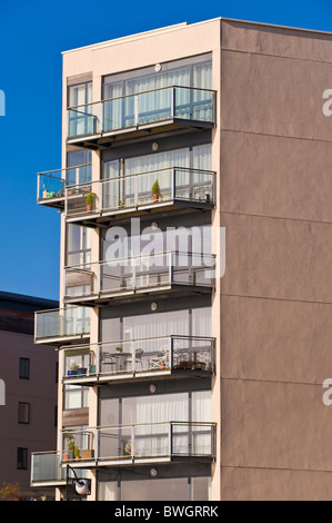 Waterfront apartments with balconies on the harbourside at Cardiff Bay South Wales UK Stock Photo