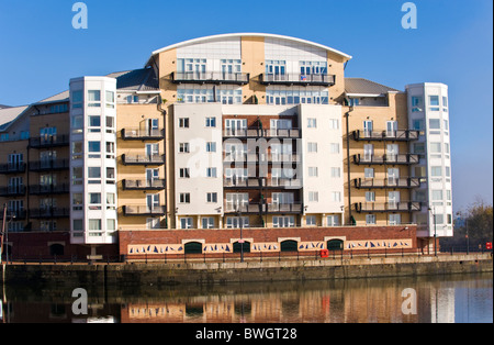 Waterfront apartments with balconies on the harbourside at Cardiff Bay South Wales UK Stock Photo