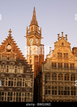 Guild houses with clock tower in Ghent, Flanders, Belgium, Europe Stock Photo