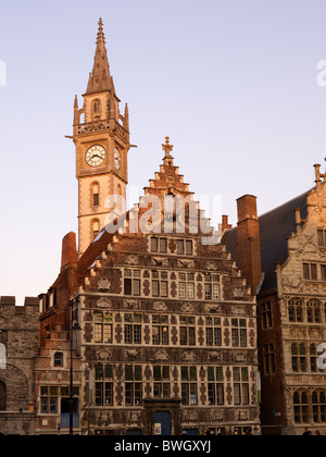 Guild houses with clock tower in Ghent, Flanders, Belgium, Europe Stock Photo