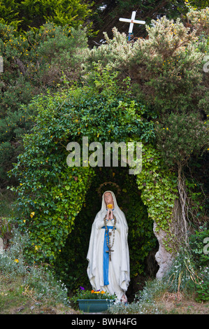 Grotto with statue of the Virgin Mary and The Immaculate Conception at Ballinspittle near Kinsale, County Cork, Ireland Stock Photo