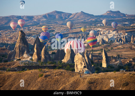 Aerial photo of Multitude of Hot air balloons in flight over Goreme National Park, Cappadocia Anatolia Turkey land 101767 Turkey Stock Photo