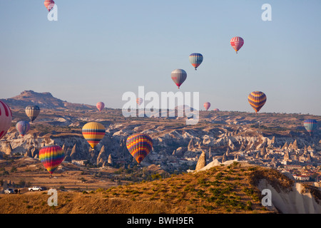 Aerial photo of Multitude of Hot air balloons in flight over Goreme National Park, Cappadocia Anatolia Turkey land 101782 Turkey Stock Photo