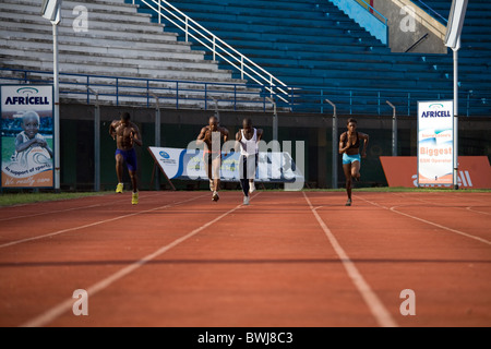 Sarah Bona fastest woman in Sierra Leone West Africa and male athletes at International Sports Stadium in Freetown Sierra Leone Stock Photo