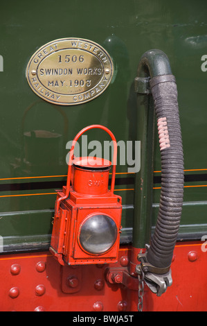 Rear light and brass builders plate on water and coal tender of City of Truro GWR 3700 Class 3440 steam engine Stock Photo