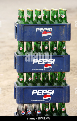 Piled Pepsi crates filled with bottles, Karachi, Pakistan Stock Photo