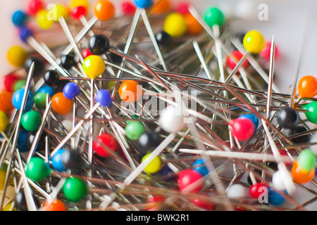Stack of Needles with multi colored heads Stock Photo