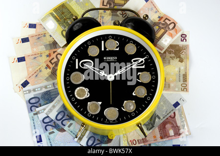 clock watch alarm clock time money Expensive business finances financial community euro bank bills banknote