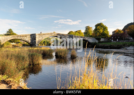 The Pont Fawr road bridge crosses the River Conwy in the old town of Llanrwst in the Conwy Valley, Gwynedd, Wales, UK Stock Photo
