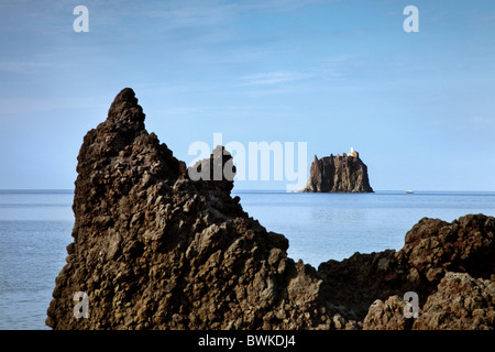 Cliff island Strombolicchio, Stromboli volcanic Island, Aeolian islands, Sicily, Italy Stock Photo