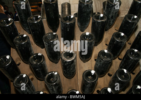 Champagne bottles in the caves at Taittinger in reims Stock Photo