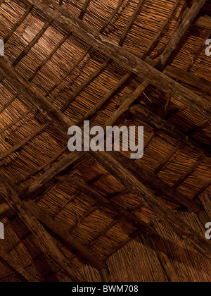 Looking up at the ceiling of the inside a traditionally-constructed great room in Tarangire, Tanzania. Stock Photo