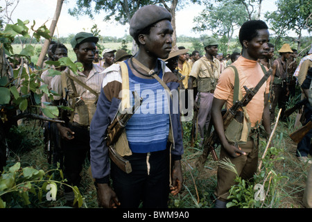 Zimbabwe. ZANU Patriotic Front troops loyal to Robert Mugabe come in from the bush as part of the peace process during the tran